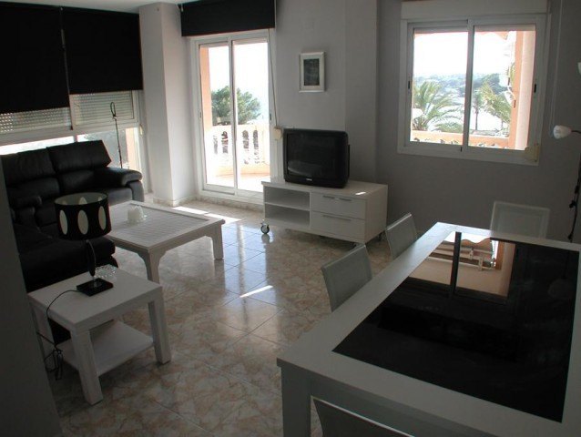 Ruim appartement met uitzicht op de zee in het centrum van Moraira .